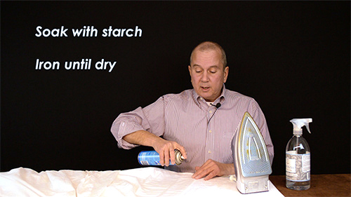 Spray a good coat of starch on the sheets